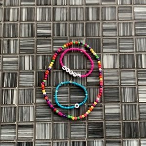 Pack of beaded bracelets and a necklace